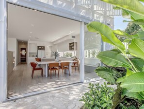 Outdoor dining - Indulge in luxury in Mermaid Waters, where a brand new bespoke home awaits you! (Gold Coast)