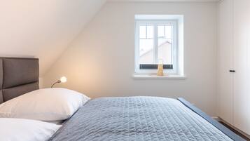 2 slaapkamers, een strijkplank/strijkijzer, gratis wifi