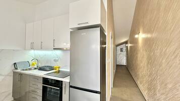 Family Apartment, Sea View | Private kitchen | Fridge, oven, stovetop, cookware/dishes/utensils