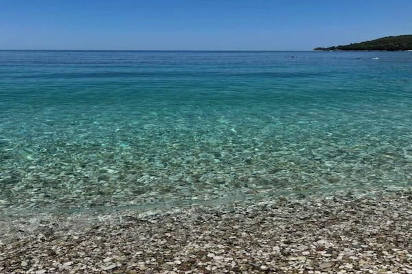 Beach nearby, white sand, 7 beach bars, rowing