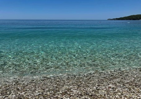 Beach nearby, white sand, 7 beach bars, rowing