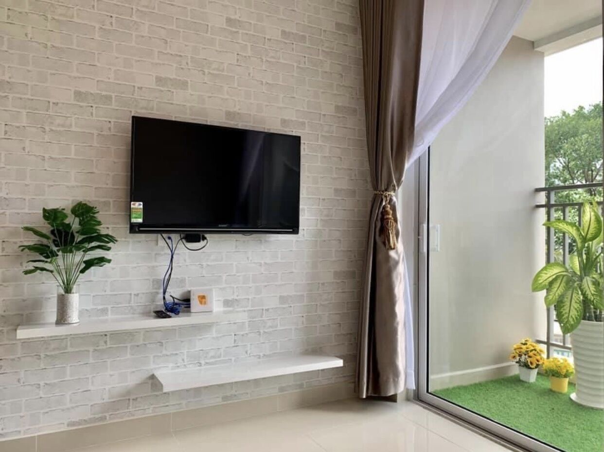 Luxury-Apartment, Nichtraucher | Wohnbereich | Flachbildfernseher