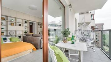 1 habitación, tabla de planchar con plancha, cuna de viaje y wifi