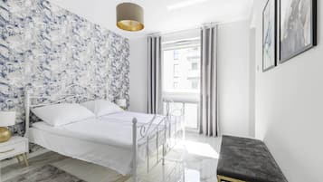 1 slaapkamer, een strijkplank/strijkijzer, wifi, beddengoed