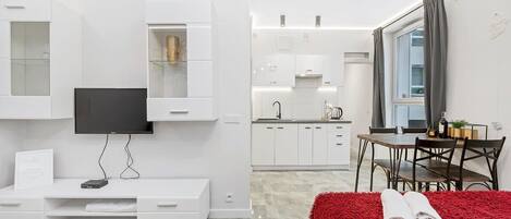 1 habitación, tabla de planchar con plancha, cuna de viaje y wifi