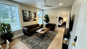 1 bedroom, desk, iron/ironing board, travel crib