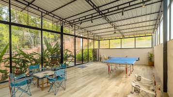 Room, 4 Bedrooms (Vivid Foliage) | Living area | Flat-screen TV