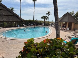A heated pool - Beachfront 2BR/2BA condo on Marco Island with pool, WiFi, and beach access. (Marco Island)