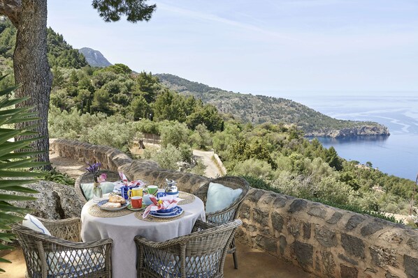 Outdoor dining - "villa in Mallorca. Infinite Blue Over the Mountains of the Serra de Tramuntana" (Deyá)