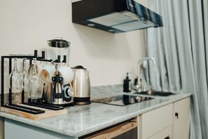 Mini-fridge, microwave, coffee/tea maker, electric kettle