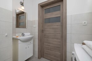 Ducha, secador de pelo