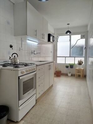 Fridge, microwave, oven, stovetop - Cozy Apartment in the Heart of Belgrano, Buenos Aires (CABA (Capital Federal))