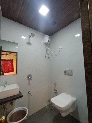 Deluxe Quadruple Room | Bathroom | Shower, rainfall showerhead - AR Residency (Mumbai)
