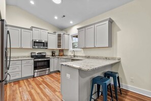 Fridge, microwave, oven, stovetop - Modern Family Retreat - Hot Tub and Fire Pit (Oak Island)