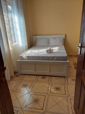 1 chambre, fer et planche à repasser, Wi-Fi, literie fournie