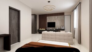 Ein modernes Schlafzimmer mit einem großen Bett, einem Fernseher, einem Kamin und einem großen Fenster.