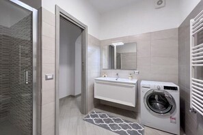 Shower, bidet, towels, soap