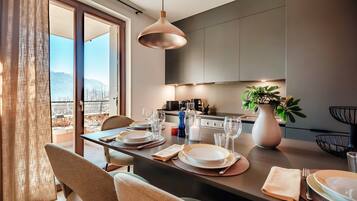 Departamento, vista al lago | Cocina privada