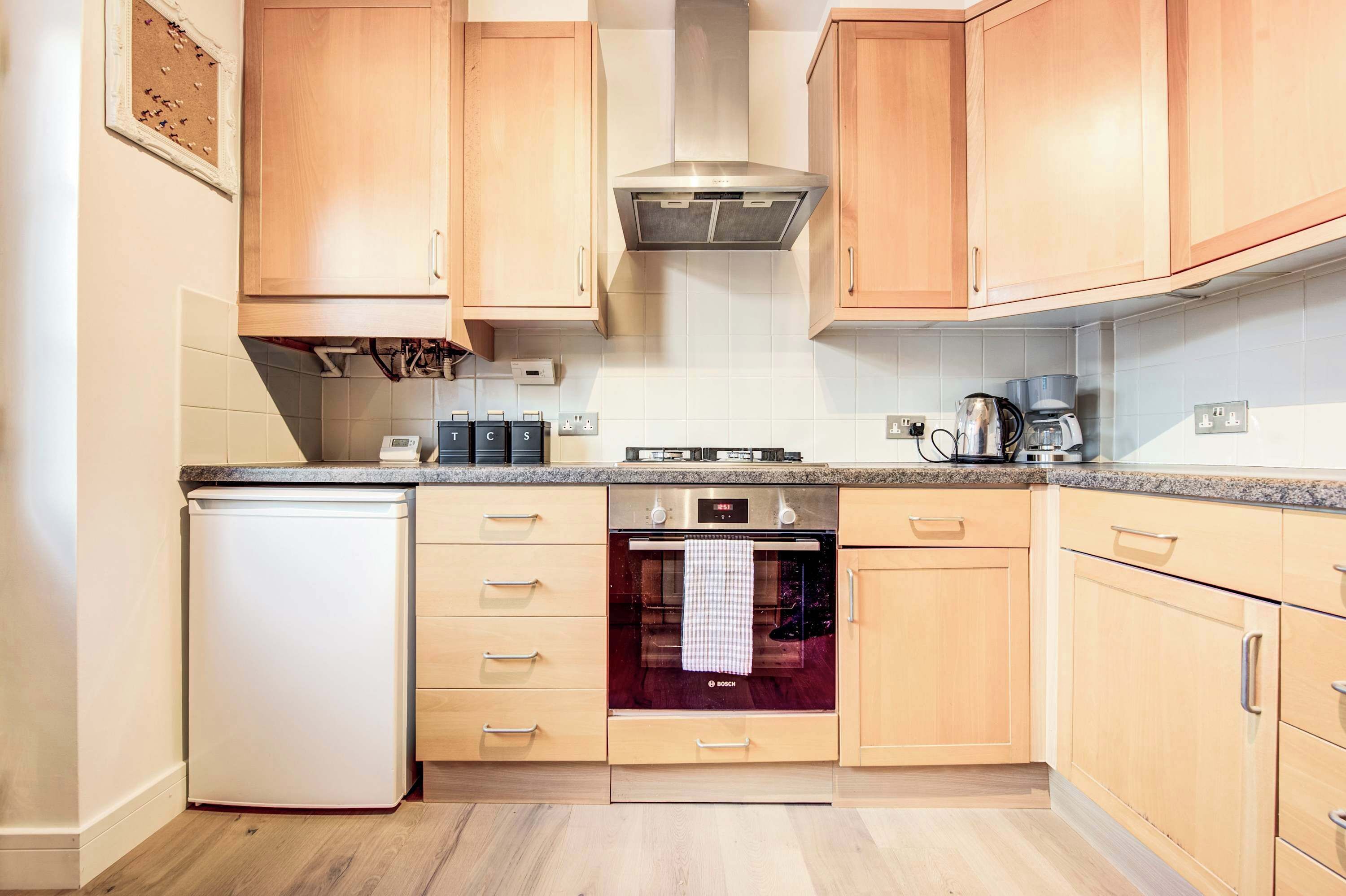 Coffee/tea maker, fridge, microwave, oven