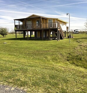 Exterior - BUNGALOW is right off the main highway TEXAS STATE HWY 87.  Easy to get there! (Bolivar Peninsula)
