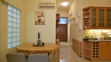 Apartment, 3 Bedrooms | Private kitchen | Fridge, microwave, oven, stovetop