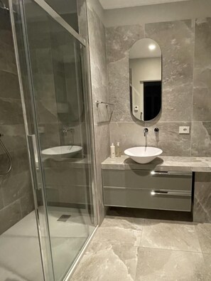 Eco-friendly toiletries, hair dryer, towels