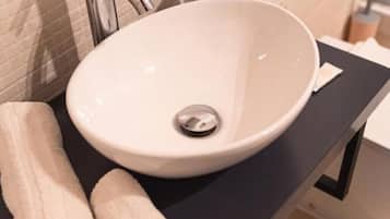 Shower, jetted tub, hair dryer, bidet