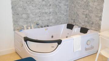 Shower, jetted tub, hair dryer, bidet