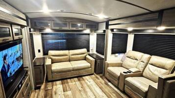 TV, DVD player, books, video library