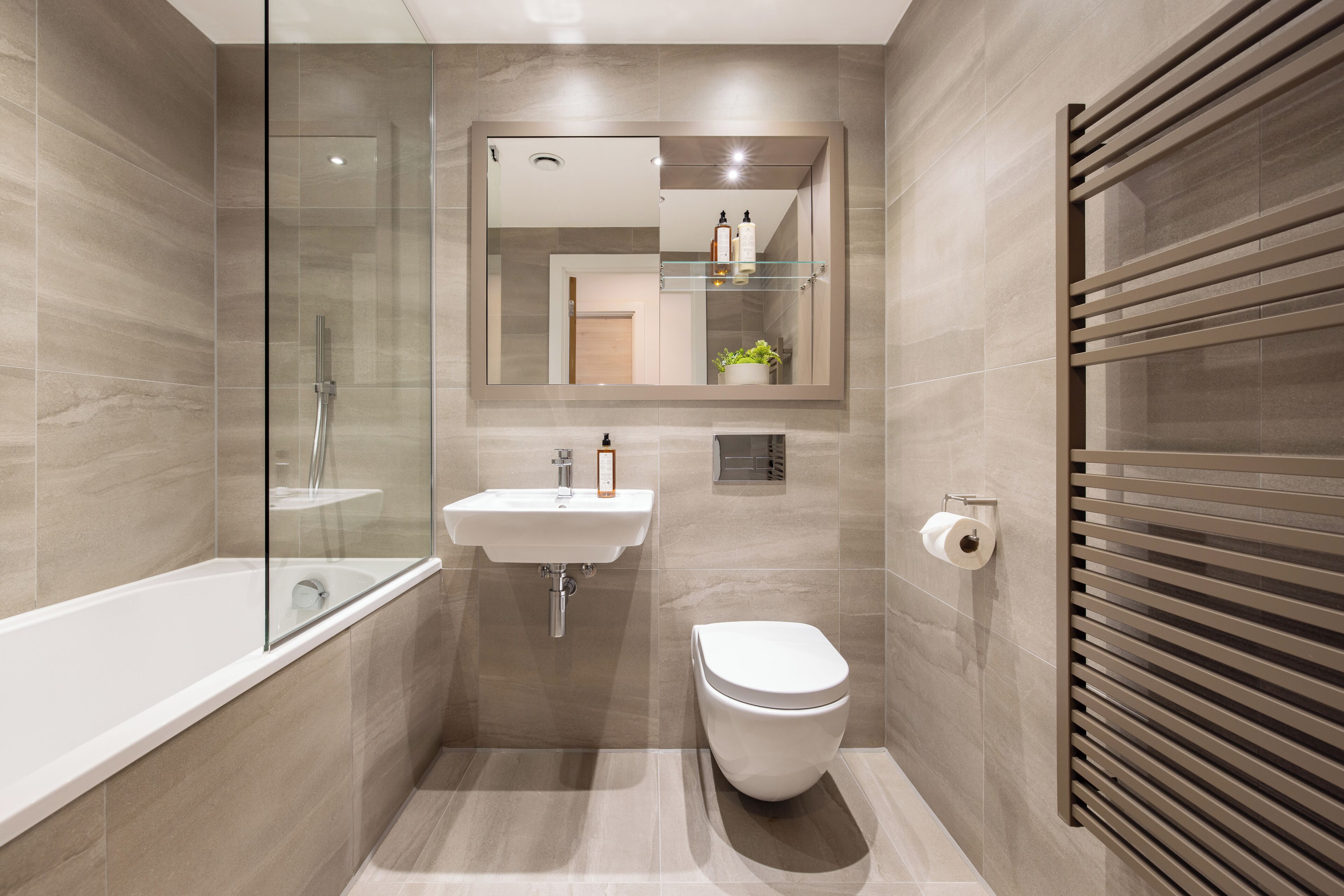 Two Bedroom Apartment | Bathroom | Rainfall showerhead, hair dryer, towels, soap