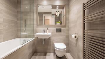 Two Bedroom Apartment | Bathroom | Rainfall showerhead, hair dryer, towels, soap