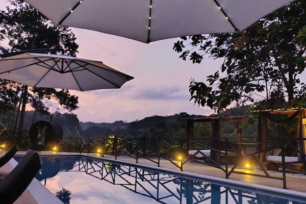 2 outdoor pools, pool umbrellas, sun loungers