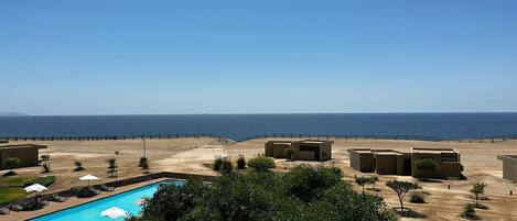 Chambre Standard Double ou avec lits jumeaux, vue partielle sur l'ocĂ©an | Vue sur la plage/lâocĂ©an