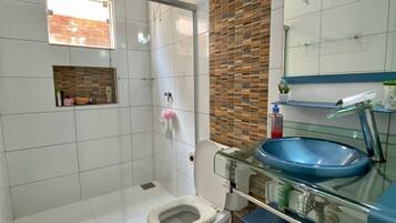 Hair dryer, towels, soap, shampoo