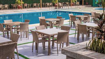 Outdoor pool, open 6:00 AM to 6:00 PM, pool umbrellas, pool loungers