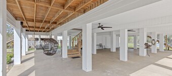Luxury riverfront home w/ pool, fishing dock, & boat house w/ lift ! Sleeps 14