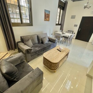 Luxury Studio, 1 King Bed, Non Smoking, Mountain View | Living area | 55-inch Smart TV with cable channels - VillaMira GuestHouse 2 Downtown Amman (Amman)