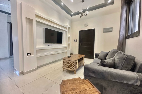 Superior Apartment, 1 King Bed, Non Smoking, Mountain View | Living area | 55-inch Smart TV with cable channels