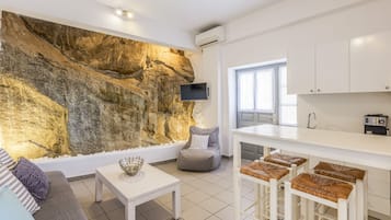 獨棟房屋 | 起居區 | 32-吋平面電視,提供衛星頻道