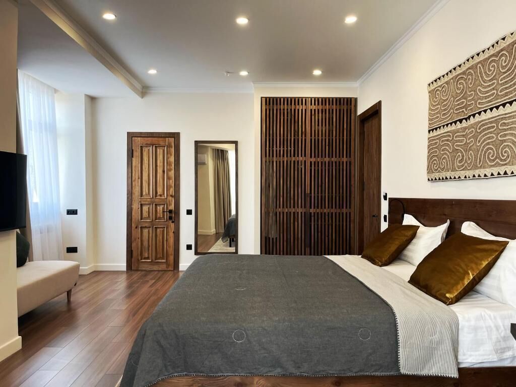 Deluxe Room, 1 King Bed, Balcony | Premium bedding, pillowtop beds, in-room safe, individually decorated