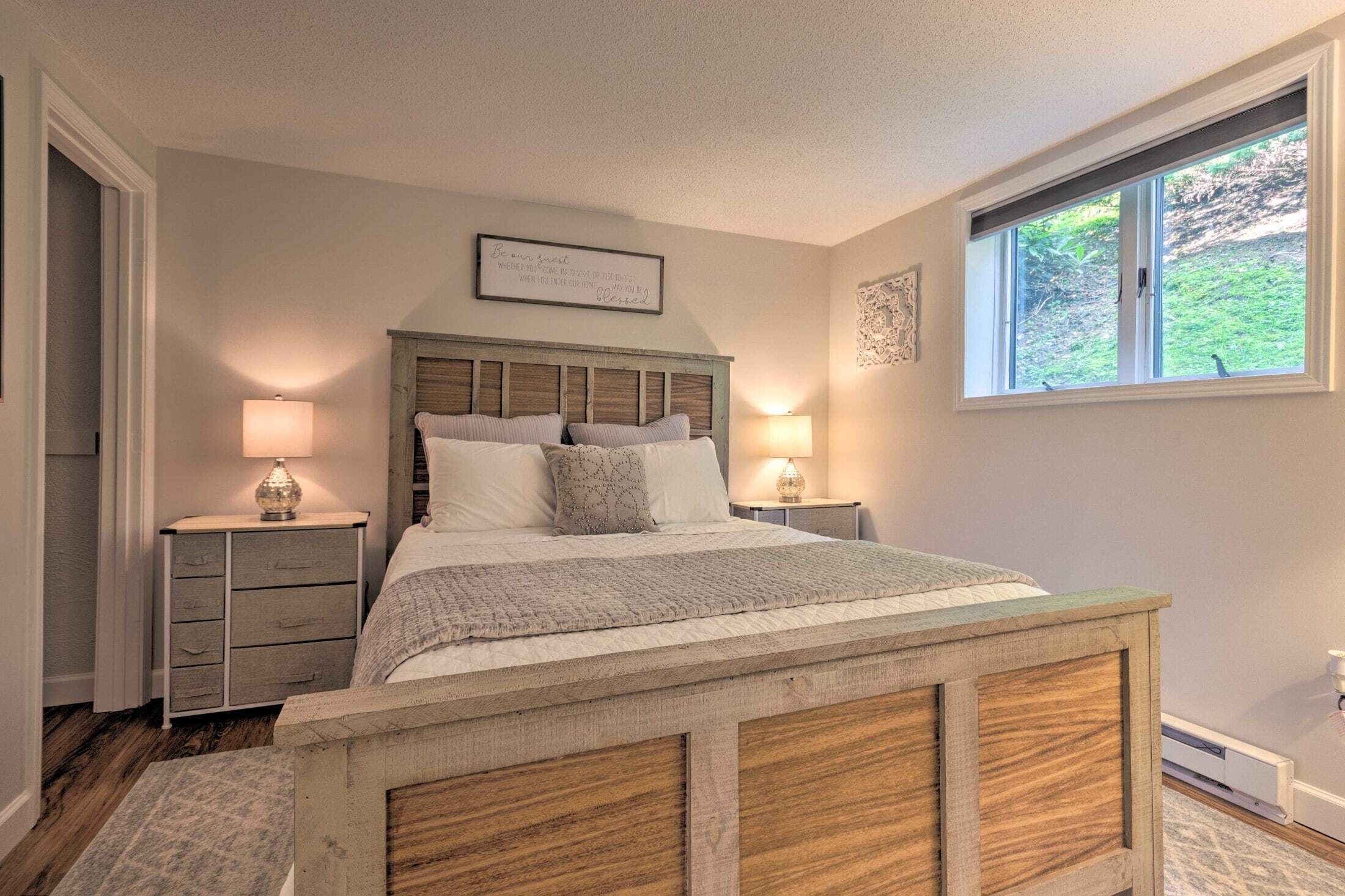 Make yourself at home in the queen bedroom with quality linens 