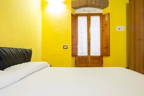 1 غرفة نوم وخزنة داخل الغرفة ومكواة/لوح كي وواي فاي