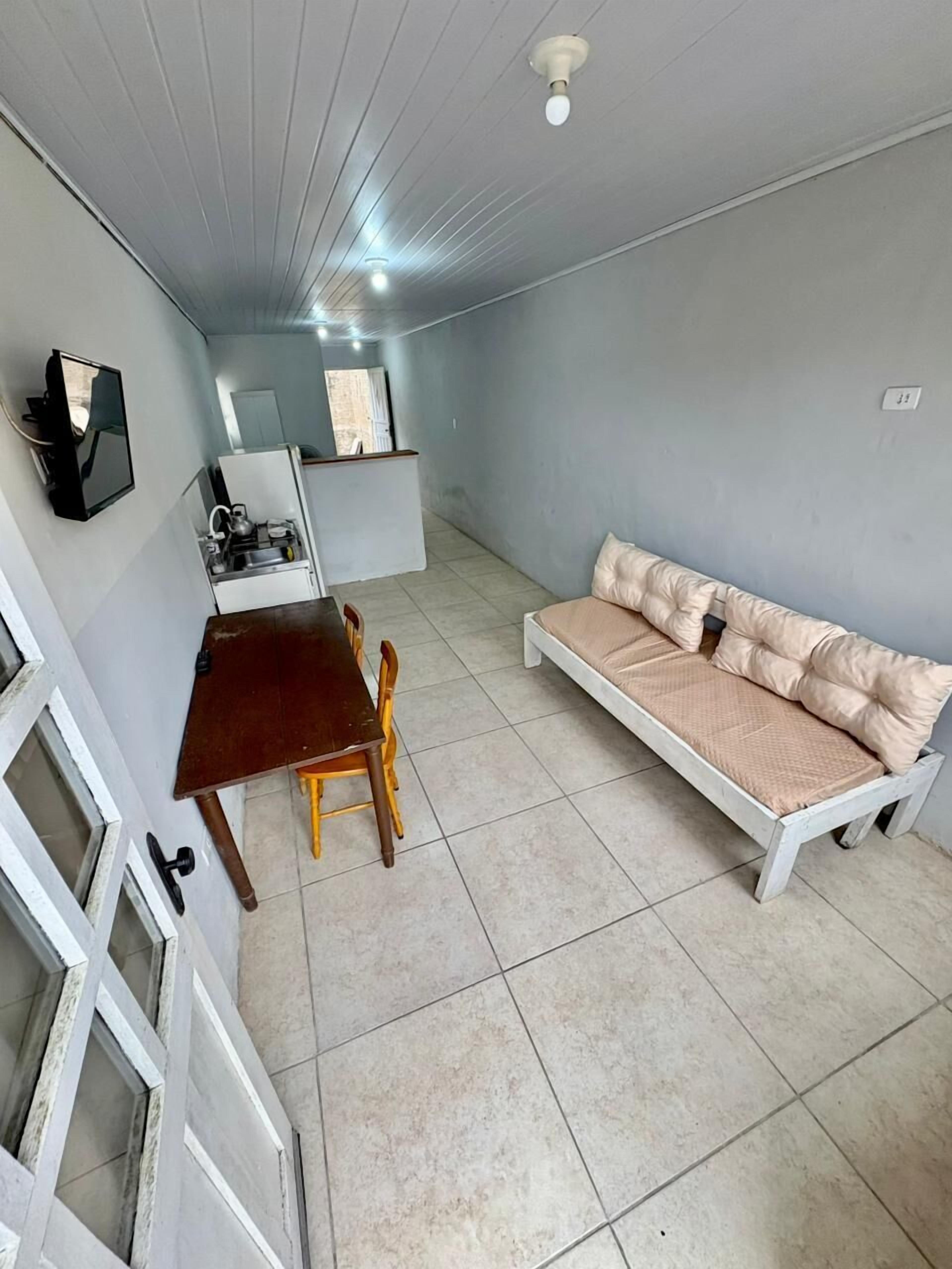 Apartment | Living room | 32-inch LCD TV with cable channels