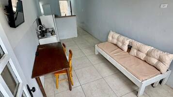 Apartment | Living room | 32-inch LCD TV with cable channels