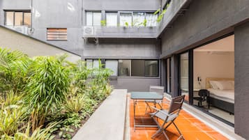 Apartamento superior | Terraço/pátio