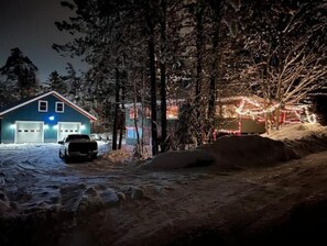 A house with a garage and a driveway. - The nest!! (Tupper Lake)