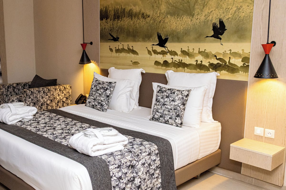 Presidential Suite | Minibar, in-room safe, blackout drapes, soundproofing
