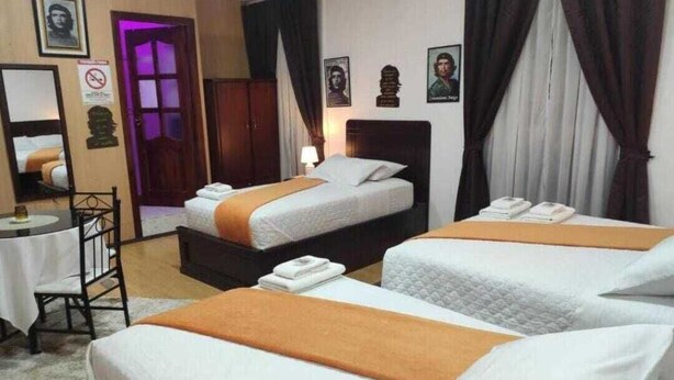 Habitación con 3 camas para 4 adultos