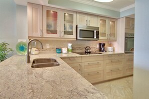 Condo, 1 King Bed (Land's End 11-406 Beach Front - Premi) | Private kitchen | Oven, toaster - Land's End 11-406 Beach Front - Premier (Treasure Island)