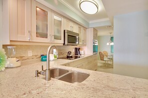 Condo, 1 King Bed (Land's End 11-406 Beach Front - Premi) | Private kitchen | Oven, toaster - Land's End 11-406 Beach Front - Premier (Treasure Island)